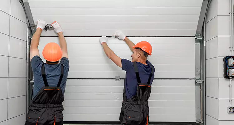 Garage Door Bottom Panel Repair in Tamarac, FL